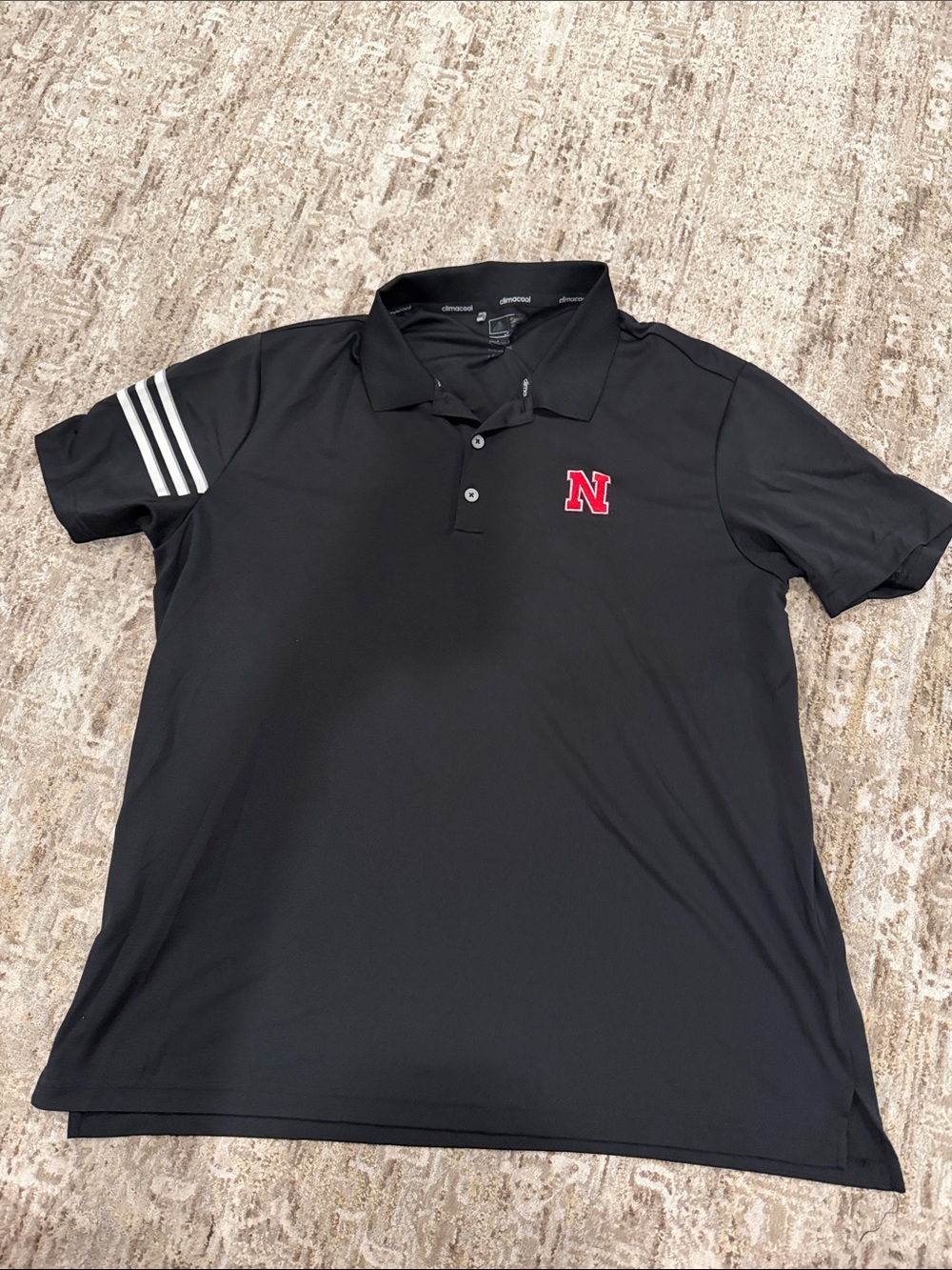 adidas Black Nebraska Polo with White Sleeve Stripes